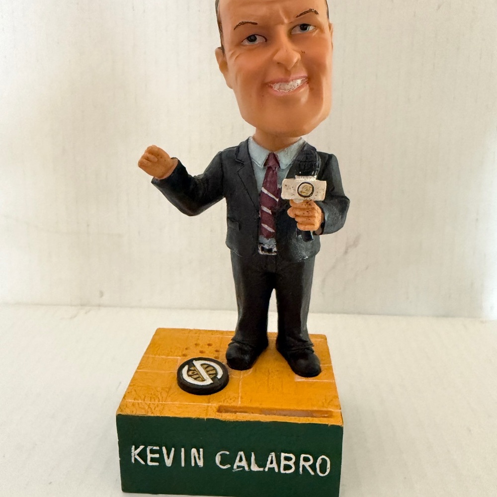 Kevin Calabro Bobblehead Figure in Black Suit with Maroon Tie.